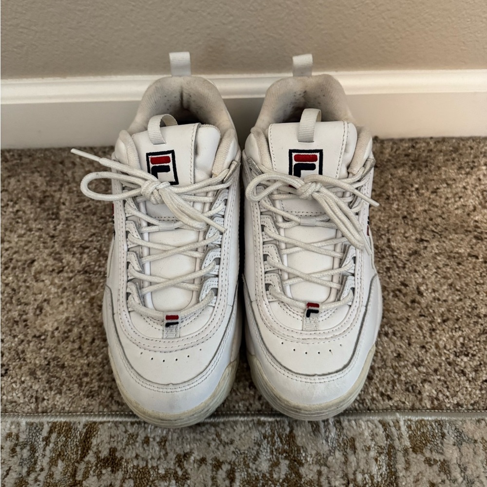 white FILA disruptor sneakers